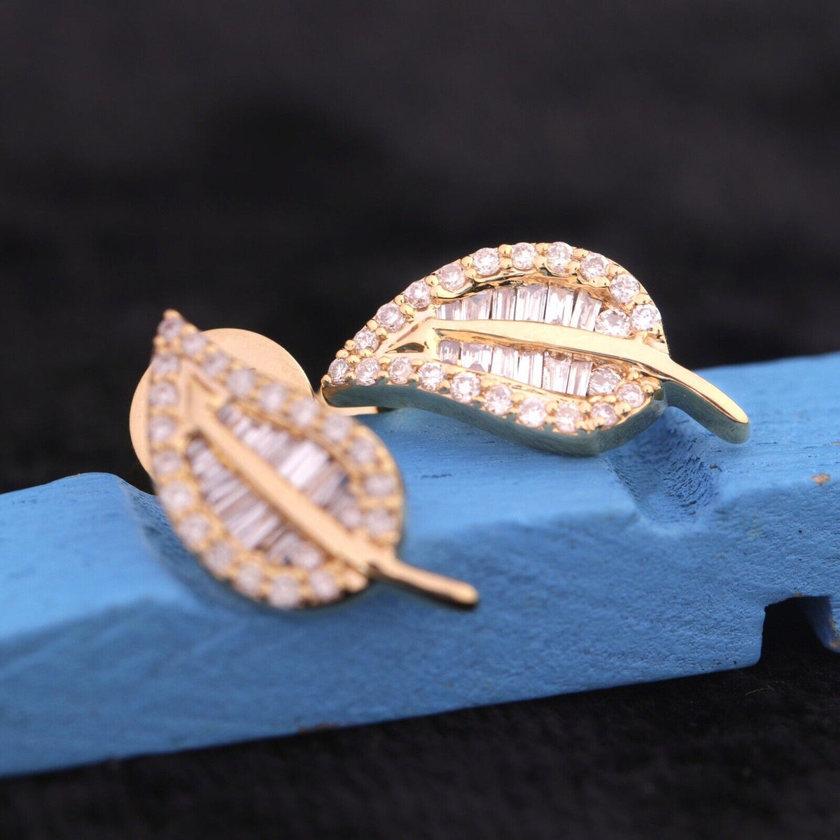 Elegant yellow gold leaf diamond stud earrings