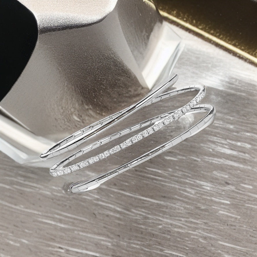 DIAMOND TWIST BANGLE IN 18CT WHITE GOLD