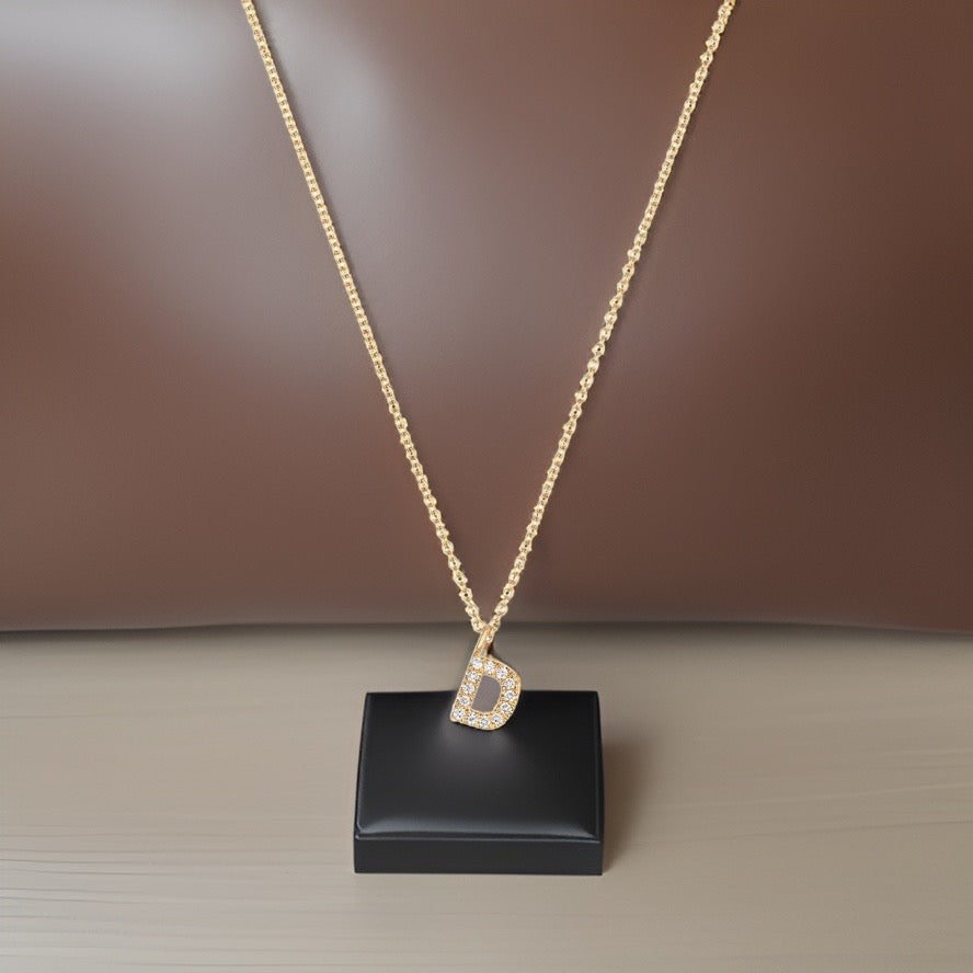 Collier Cervin Blanc avec initiale D en diamant et or 18 carats