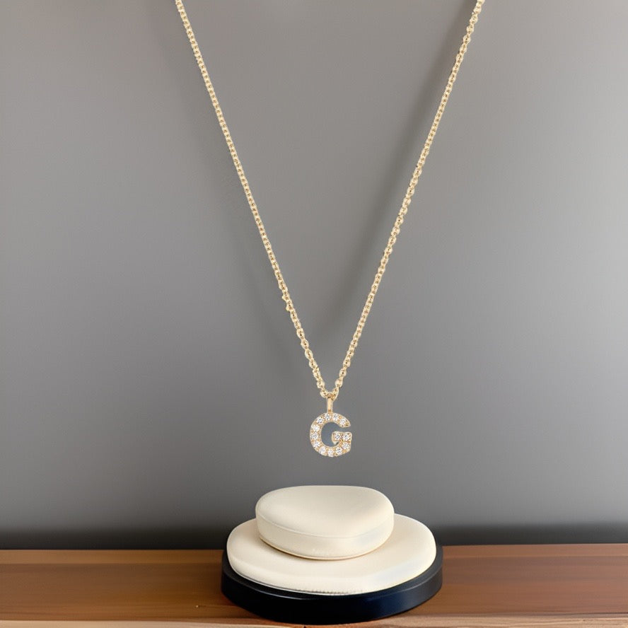 Collier Cervin Blanc avec initiale G en diamant et or 18 carats