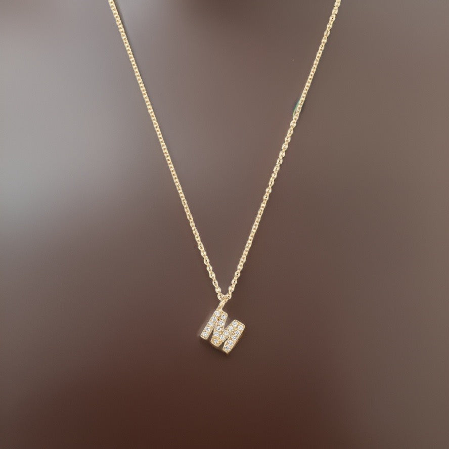 Collier Cervin Blanc avec initiale M en diamant et or 18 carats