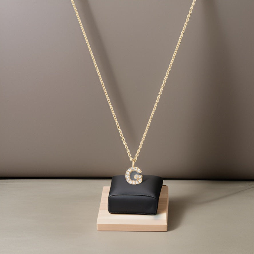 Collier Cervin Blanc avec initiale G en diamant et or 18 carats