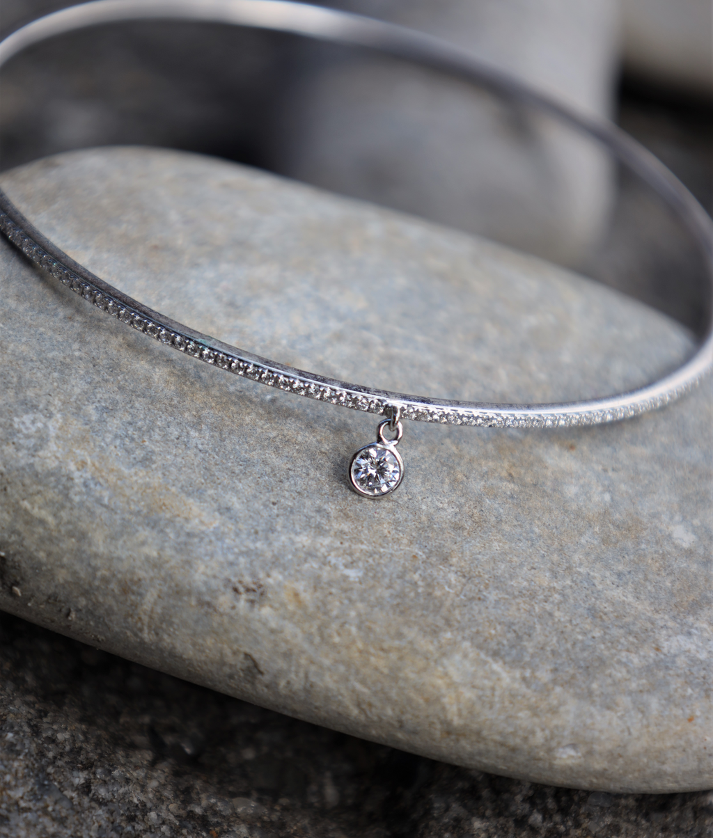 White Gold Eternity Diamond Bangle with solitaire charm