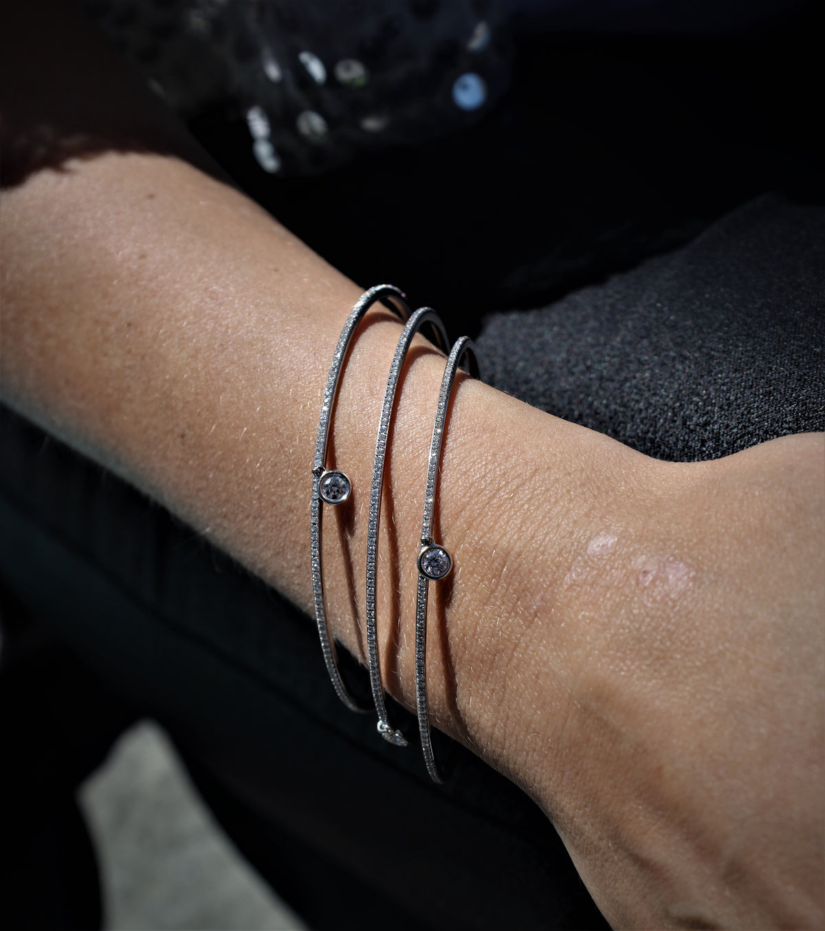 White Gold Eternity Diamond Bangle with solitaire charm