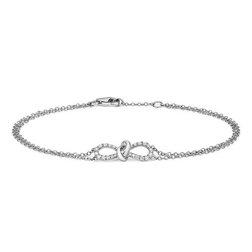 BRACELET NŒUD EN OR BLANC 18 CARATS ET DIAMANTS