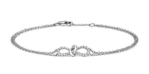 BRACELET NŒUD EN OR BLANC 18 CARATS ET DIAMANTS