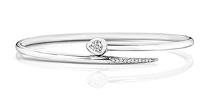 DIAMOND HEART CROSSOVER BANGLE IN 18CT WHITE GOLD