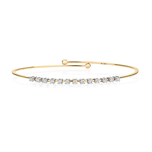 DIAMOND CLAW SET FLEXI BANGLE IN 18CT GOLD