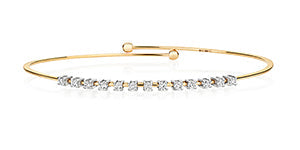 DIAMOND CLAW SET FLEXI BANGLE IN 18CT GOLD