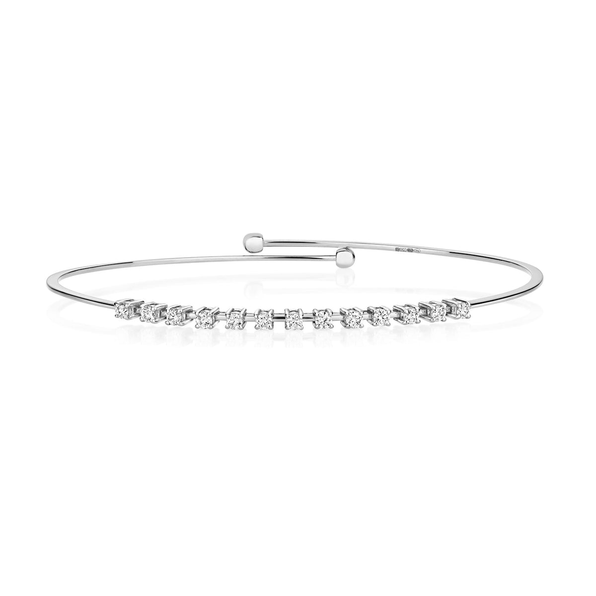 DIAMOND CLAW SET FLEXI BANGLE IN 18CT WHITE GOLD