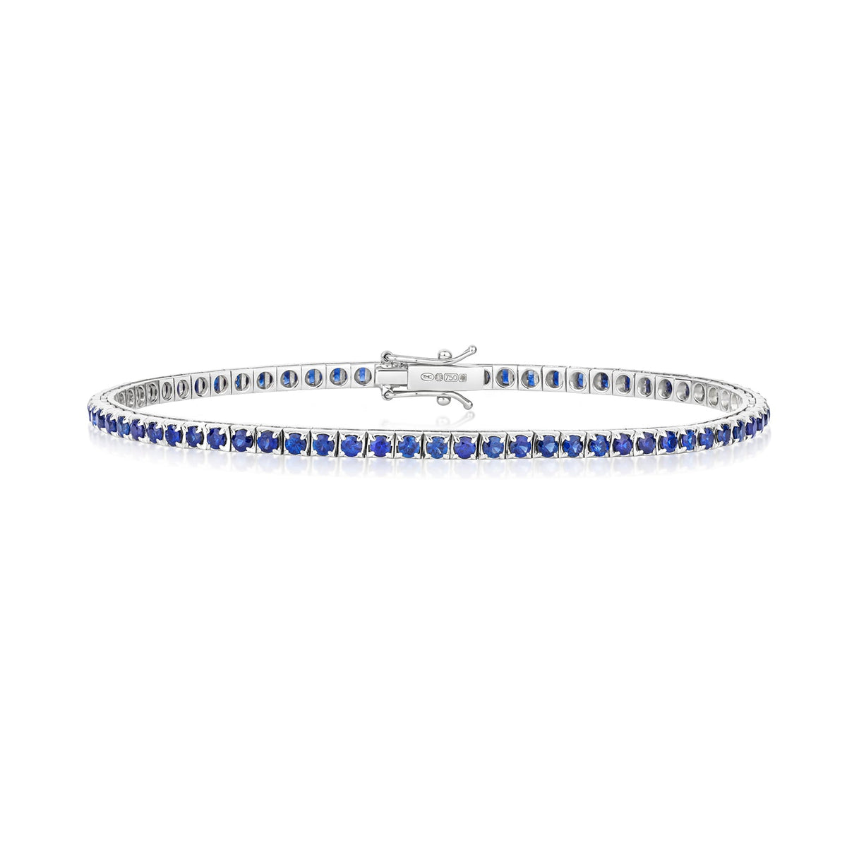 Dazzling sapphire tennis bracelet in white gold