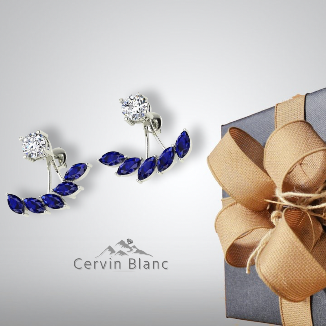 Boucles d'oreilles en or blanc serties de saphirs et de diamants.