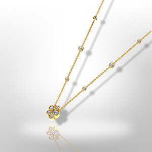 18ct yellow gold necklace, diamond bubble necklace, 1.25ct diamonds, luxurious jewelry, formal jewelry, elegant accessory, timeless jewelry, exquisite craftsmanship, high-quality materials