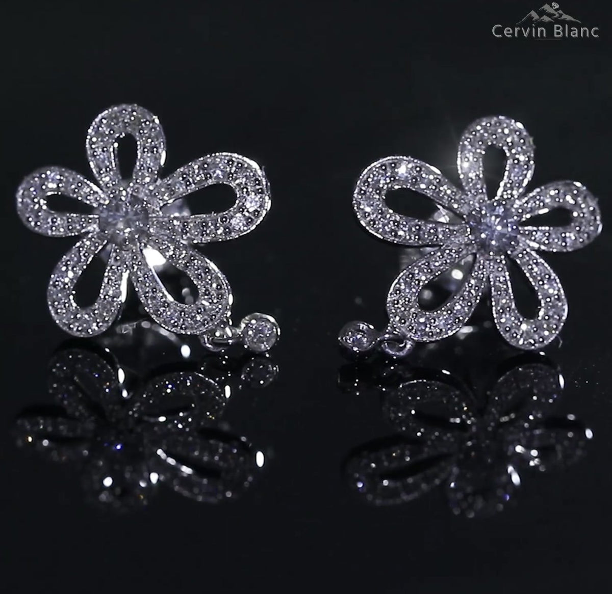 Delicate flower diamond studs