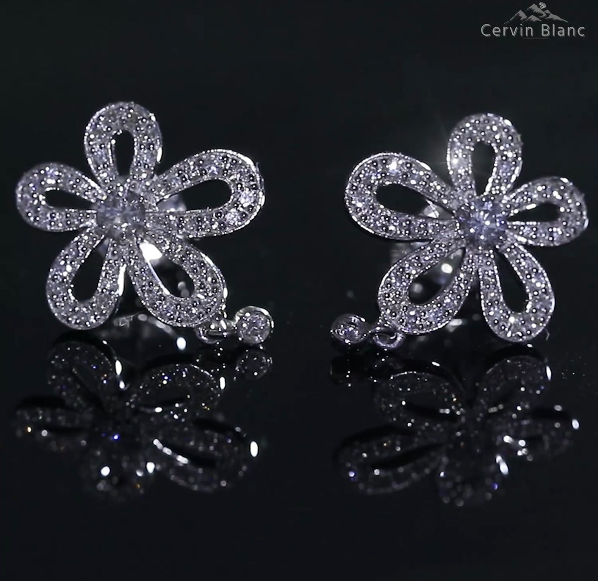 Opulent 18ct gold Plumeria diamond studs