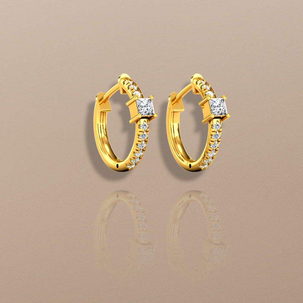  Orecchini a cerchio con diamanti da 0,40 ct in oro giallo
