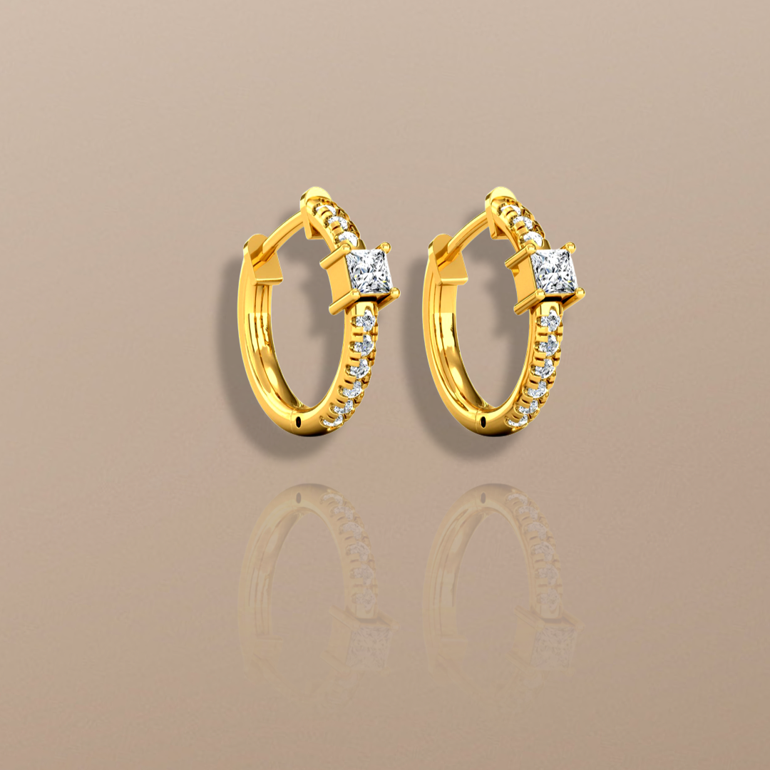  Orecchini a cerchio con diamanti da 0,40 ct in oro giallo
