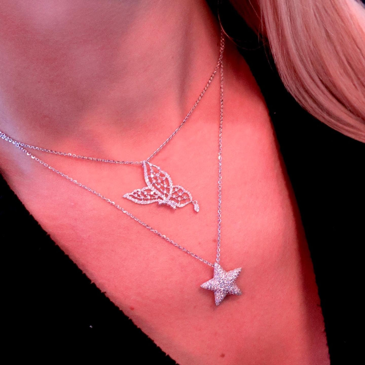 Delicate butterfly and star diamond necklace