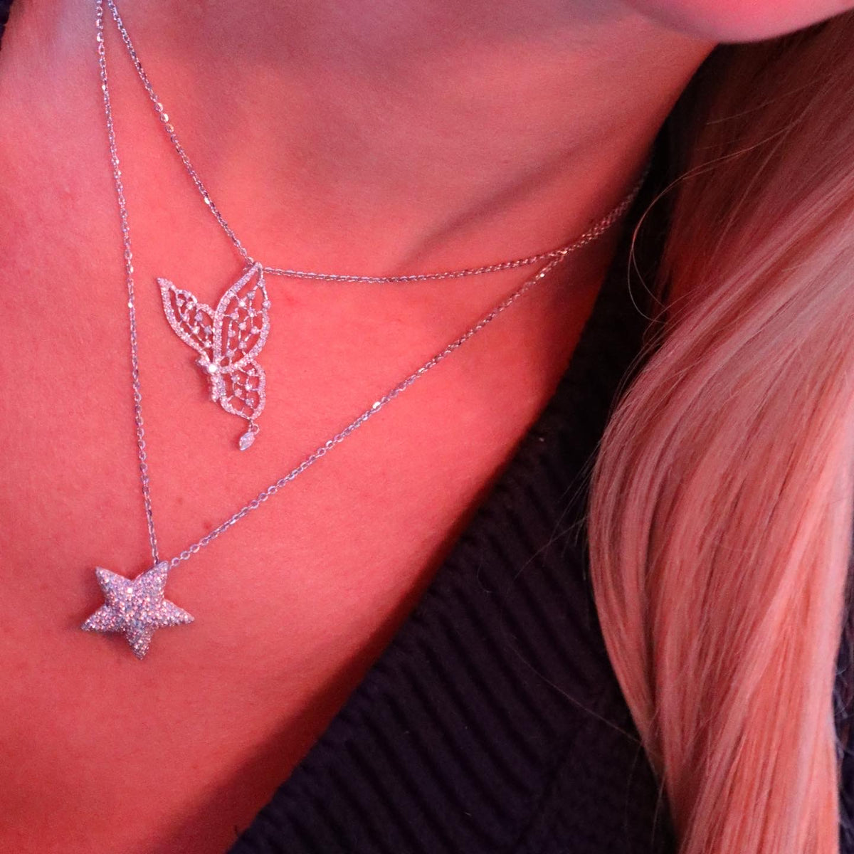 White gold butterfly necklace with 0.70ct diamond