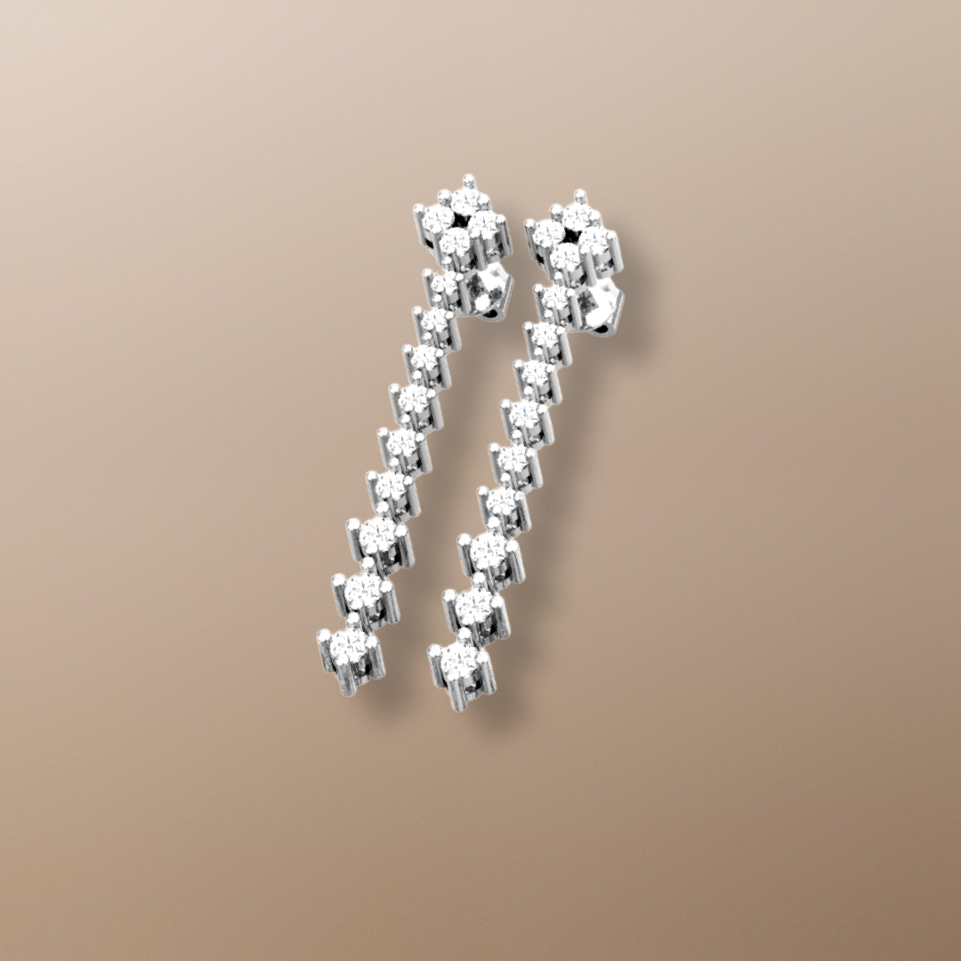 Boucles d'oreilles pendantes de tennis en or 0,85 ct