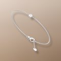 18ct white gold bracelet Solitaire diamond bracelet 0.15ct diamond jewelry Elegant diamond bracelet High-quality diamond accessory Classic four-prong setting bracelet Timeless jewelry piece
