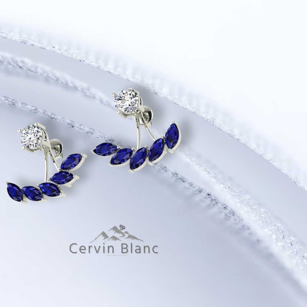 Boucles d'oreilles en or blanc serties de saphirs et de diamants.