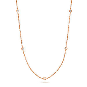 Collier rubis en or rose 18 carats serti de diamants
