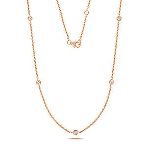 Collier rubis en or rose 18 carats serti de diamants