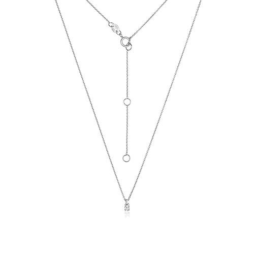 Collier en or blanc 18 carats serti de diamants et monté sur quatre griffes.