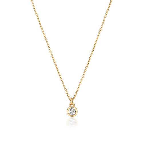 Collier solitaire en diamants serti rubis et or 18 carats