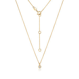 Collier solitaire en diamants serti rubis et or 18 carats
