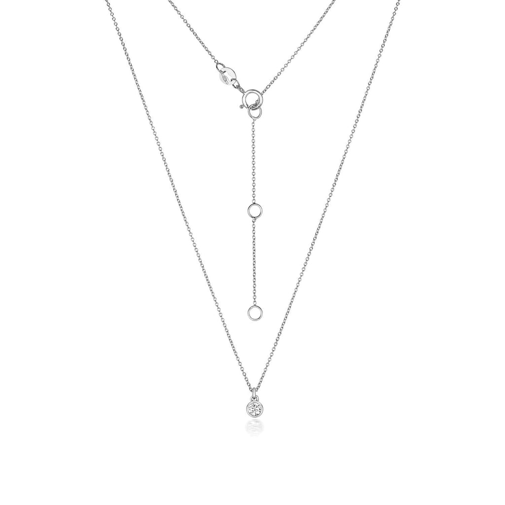 Collier solitaire en diamants et rubis en or blanc 18 carats