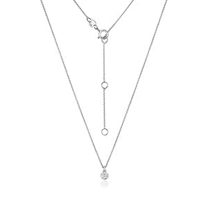 Collier solitaire en diamants et rubis en or blanc 18 carats