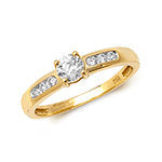 Diamond solitaire with channel shoulders ring