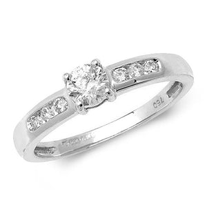 DIAMOND SOLITAIRE WITH CHANNEL SET SHOULDERS RING IN 18CT WHITE GOLD