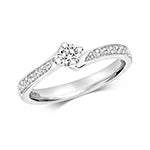 DIAMOND SOLITAIRE CLAW SET WITH GRAIN SET SHOULDERS RING IN 18CT WHITE GOLD